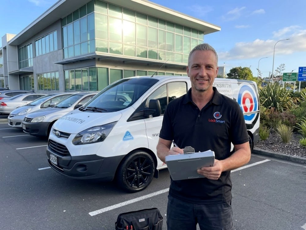 LockSmart Master Locksmith conducting a free home security assessment at an Auckland property