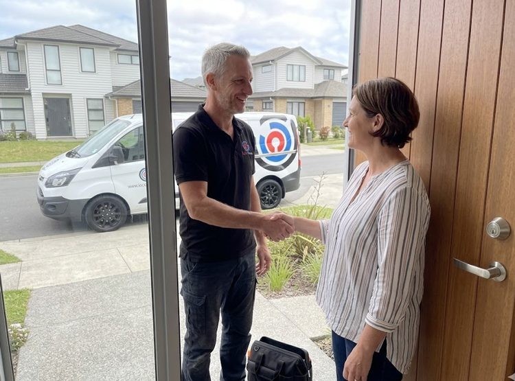 LockSmart locksmith repairing a damaged residential door lock in Auckland