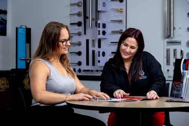 LockSmart Master Locksmith conducting a free home security assessment at an Auckland property