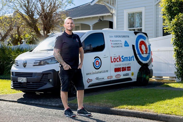 LockSmart Master Locksmith installing a new deadbolt lock on an Auckland home